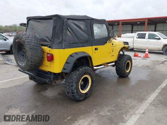 2000 Jeep Wrangler SE with VIN 1J4FA29P5YP705215, listed as a IAAI auction lot 41920532 with 92,927 mi miles and . Bid and sale history available at DreamBid. Image 4.