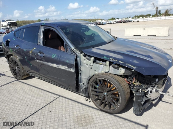 2022 BMW X6 M50i with VIN 5UXCY8C06N9K56709, listed as a Copart auction lot 80149504 with 46,614 mi miles and Salvage Title. Bid and sale history available at carsss.com. Image 4.