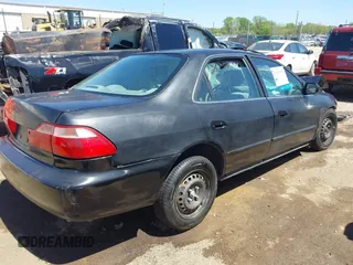 1998 Honda Accord LX with VIN 1HGCG5548WA010975, listed as a IAAI auction lot 39183531 with Not provided miles and . Bid and sale history available at DreamBid. Image 4.