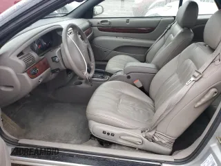 2001 Chrysler Sebring LXi z VIN 1C3EL55UX1N556511, wystawiony jako Copart lot #81047244 z przebiegiem 83 830 mil mil oraz Czysty tytuł • Clean title. Historia ofert i sprzedaży dostępna na DreamBid. Obrazek 7.