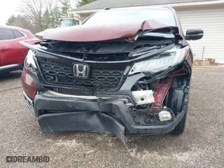 2019 Honda Passport Touring with VIN 5FNYF8H99KB005625, listed as a IAAI auction lot 41905030 with 64,998 mi miles. Bid and sale history available at carsss.com. Image 6.