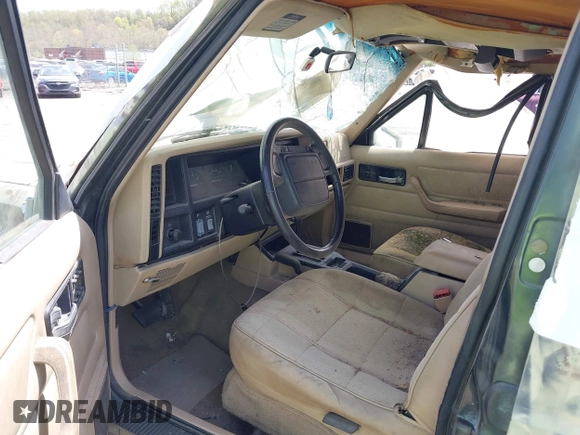 1996 Jeep Cherokee Sport with VIN 1J4FJ68S2TL154142, listed as a IAAI auction lot 42116515 with 197,095 mi miles and . Bid and sale history available at DreamBid. Image 5.