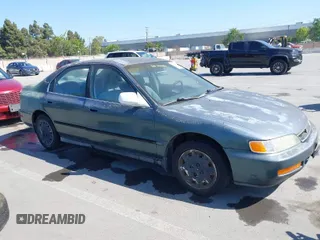 1997 Honda Accord LX with VIN 1HGCD5637VA212185, listed as a IAAI auction lot 42093376 with 239,668 mi miles and . Bid and sale history available at carsss.com. Image 1.