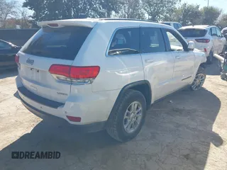 2018 Jeep Grand Cherokee Laredo E with VIN 1C4RJEAG2JC428990, listed as a IAAI auction lot 41218996 with 123,758 mi miles. Bid and sale history available at carsss.com. Image 4.