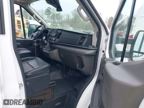 2020 Ford Transit Cargo with VIN 1FTBF4XG3LKB15685, listed as a IAAI auction lot 41967446 with 127,392 mi miles and . Bid and sale history available at DreamBid. Image 5.