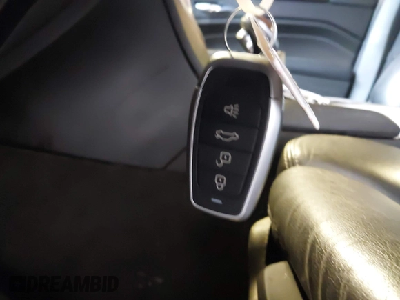 2014 Cadillac SRX Performance Collection with VIN 3GYFNFE39ES659013, listed as a IAAI auction lot 42264069 with 129,122 mi miles and . Bid and sale history available at DreamBid. Image 11.
