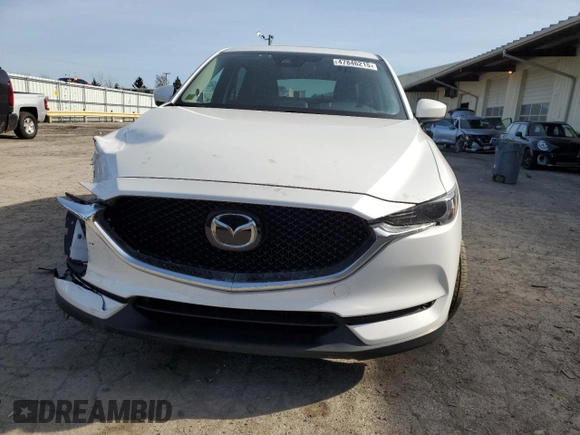 2020 Mazda CX-5 Grand Touring with VIN JM3KFBDM0L1810699, listed as a Copart auction lot 47846215 with 61,441 mi miles and Salvage Title. Bid and sale history available at carsss.com. Image 5.