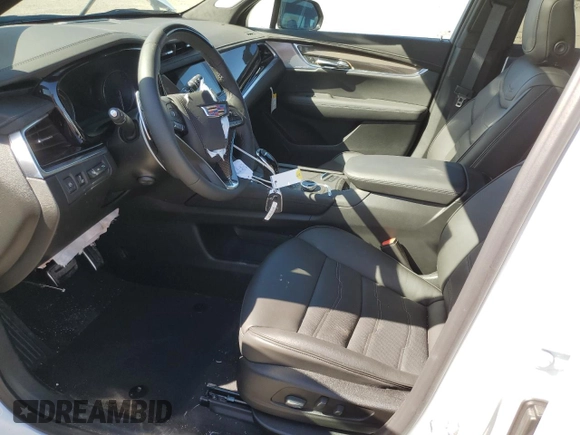 2025 Cadillac XT6 AWD Sport z VIN 1GYKPHRS5SZ101521, wystawiony jako Copart lot #48552185 z przebiegiem 262 mil mil oraz Szkody całkowita. Historia ofert i sprzedaży dostępna na DreamBid. Obrazek 7.