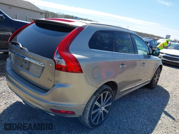 2016 Volvo XC60 T6 Drive-E Platinum z VIN YV449MDMXG2867316, wystawiony jako IAAI lot #41954778 z przebiegiem 97 586 mil mil oraz . Historia ofert i sprzedaży dostępna na DreamBid. Obrazek 4.