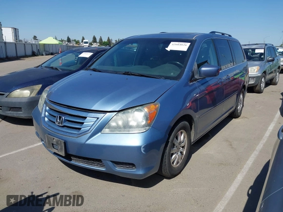 2010 Honda Odyssey EX-L with VIN 5FNRL3H64AB071603, listed as a IAAI auction lot 42084026 with 199,753 mi miles. Bid and sale history available at carsss.com. Image 2.