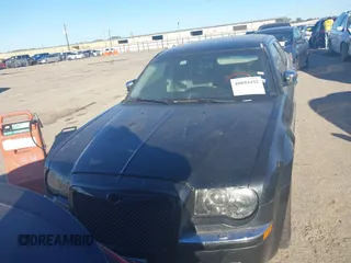 2006 Chrysler 300 C with VIN 2C3LA63H56H246663, listed as a IAAI auction lot 40894432 with 145,629 mi miles. Bid and sale history available at carsss.com. Image 6.