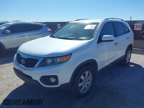 2013 Kia Sorento LX with VIN 5XYKT4A2XDG337427, listed as a IAAI auction lot 41730880 with 219,984 mi miles. Bid and sale history available at carsss.com. Image 6.