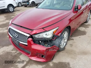2014 Infiniti Q50 Sport with VIN JN1BV7AR4EM702549, listed as a IAAI auction lot 41803344 with 197,187 mi miles and . Bid and sale history available at carsss.com. Image 6.
