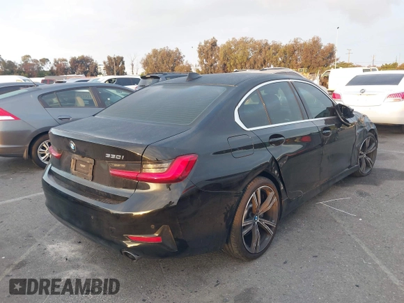 2021 BMW 3 Series 330i with VIN 3MW5R1J02M8B95303, listed as a IAAI auction lot 42184843 with 55,928 mi miles and . Bid and sale history available at carsss.com. Image 4.