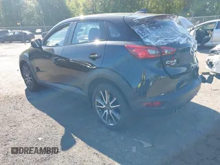 2018 Mazda CX-3 Touring z VIN JM1DKFC73J0321605, wystawiony jako IAAI lot #42355269 z przebiegiem 40 053 mil mil oraz . Historia ofert i sprzedaży dostępna na DreamBid. Obrazek 3.
