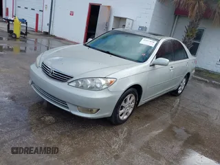 2005 Toyota Camry LE with VIN JTDBF32KX50163799, listed as a IAAI auction lot 41937898 with 140,616 mi miles and . Bid and sale history available at DreamBid. Image 2.
