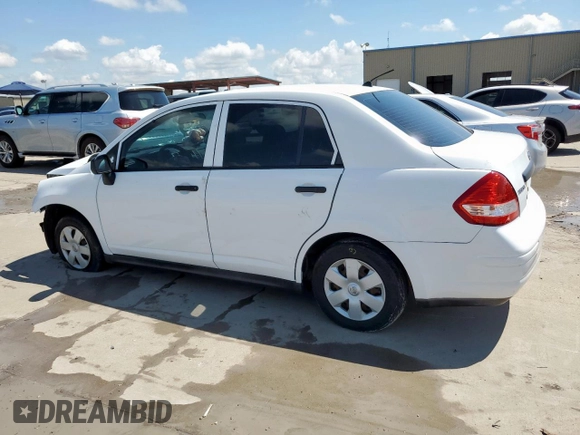 2010 Nissan Versa 1.6 with VIN 3N1CC1AP5AL403629, listed as a Copart auction lot 58264865 with 86,399 mi miles and Salvage title. Bid and sale history available at DreamBid. Image 2.
