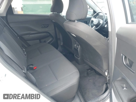 2024 Hyundai Kona SEL with VIN KM8HCCABXRU042463, listed as a IAAI auction lot 42090998 with 33,512 mi miles. Bid and sale history available at carsss.com. Image 8.