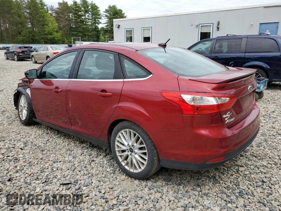 2014 Ford Focus Titanium with VIN 1FADP3J20EL352909, listed as a Copart auction lot 58501085 with 174,388 mi miles and Salvage title. Bid and sale history available at DreamBid. Image 2.