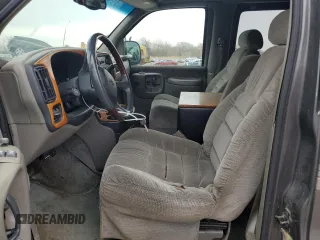 1999 Chevrolet Express z VIN 1GBFG15R9X1089305, wystawiony jako Copart lot #51810075 z przebiegiem 130 441 mil mil oraz Szkoda całkowita • Salvage title. Historia ofert i sprzedaży dostępna na DreamBid. Obrazek 7.
