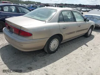 1998 Buick Century Custom with VIN 2G4WS52M9W1401444, listed as a IAAI auction lot 42067551 with 246,227 mi miles. Bid and sale history available at carsss.com. Image 4.