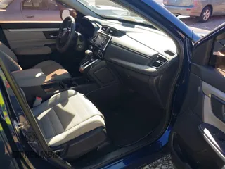 2018 Honda CR-V LX with VIN 2HKRW5H31JH411364, listed as a IAAI auction lot 41825257 with 135,468 mi miles and . Bid and sale history available at DreamBid. Image 5.