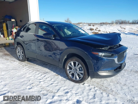 2022 Mazda CX-30 S Select with VIN 3MVDMBBL9NM448264, listed as a IAAI auction lot 41294686 with 9,324 mi miles and . Bid and sale history available at DreamBid. Image 1.