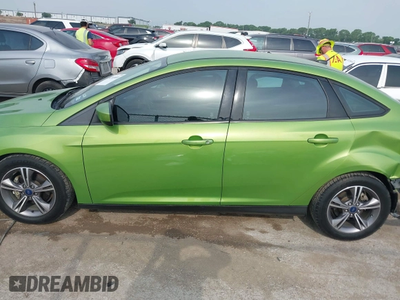 2018 Ford Focus SE z VIN 1FADP3FE5JL222542, wystawiony jako IAAI lot #42265608 z przebiegiem 107 397 mil mil oraz . Historia ofert i sprzedaży dostępna na DreamBid. Obrazek 14.