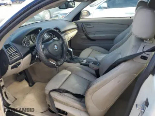 2009 BMW 1 Series 135i with VIN WBAUC73509VK94795, listed as a Copart auction lot 74760544 with 0 mi miles and Salvage Title. Bid and sale history available at carsss.com. Image 7.