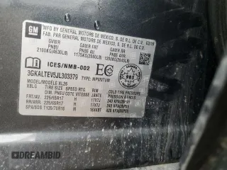 2018 GMC Terrain SLE z VIN 3GKALTEV5JL303379, wystawiony jako Copart lot #56303395 z przebiegiem Nie podano mil oraz Szkody całkowita. Historia ofert i sprzedaży dostępna na DreamBid. Obrazek 12.