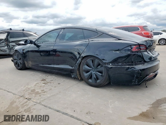 2023 Tesla Model S with VIN 5YJSA1E59PF512318, listed as a Copart auction lot 58377895 with 34,402 mi miles and Salvage title. Bid and sale history available at DreamBid. Image 2.