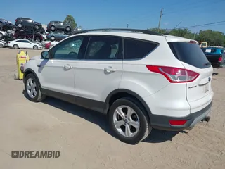 2014 Ford Escape SE with VIN 1FMCU0G94EUA35464, listed as a IAAI auction lot 42046944 with 88,504 mi miles. Bid and sale history available at carsss.com. Image 3.