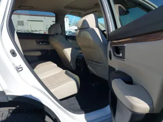 2021 Honda CR-V EX-L with VIN 2HKRW2H8XMH612534, listed as a IAAI auction lot 41770020 with 63,382 mi miles and . Bid and sale history available at carsss.com. Image 8.