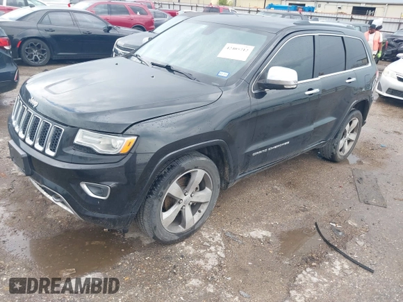 2015 Jeep Grand Cherokee Overland with VIN 1C4RJECG1FC769950, listed as a IAAI auction lot 42405712 with 217,514 mi miles and . Bid and sale history available at DreamBid. Image 17.