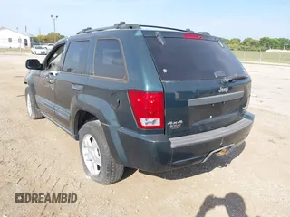 2005 Jeep Grand Cherokee Laredo z VIN 1J4GR48KX5C593240, wystawiony jako IAAI lot #40390746 z przebiegiem 177 646 mil mil oraz . Historia ofert i sprzedaży dostępna na DreamBid. Obrazek 3.