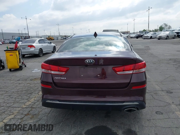 2019 Kia Optima LX z VIN 5XXGT4L37KG354649, wystawiony jako IAAI lot #42130410 z przebiegiem 61 315 mil mil oraz . Historia ofert i sprzedaży dostępna na DreamBid. Obrazek 15.