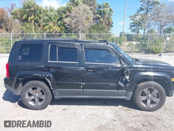 2014 Jeep Patriot Latitude with VIN 1C4NJPFA6ED680773, listed as a IAAI auction lot 41569916 with 135,590 mi miles and . Bid and sale history available at carsss.com. Image 13.