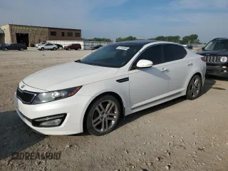 2013 Kia Optima SX z VIN 5XXGR4A68DG144821, wystawiony jako Copart lot #61248385 z przebiegiem 143 043 mil mil oraz Czysty tytuł • Clean title. Historia ofert i sprzedaży dostępna na DreamBid. Obrazek 1.