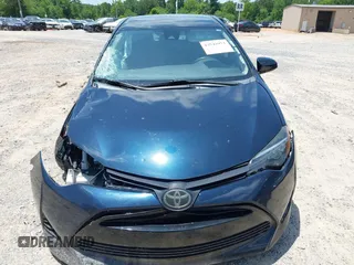 2018 Toyota Corolla L with VIN 5YFBURHE5JP836783, listed as a IAAI auction lot 42543973 with 112,107 mi miles and . Bid and sale history available at DreamBid. Image 12.