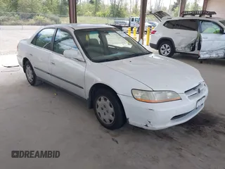 1998 Honda Accord LX with VIN 1HGCG5640WA004358, listed as a IAAI auction lot 42643808 with Not provided miles and . Bid and sale history available at DreamBid. Image 1.