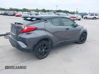 2021 Toyota C-HR LE with VIN JTNKHMBX3M1120177, listed as a IAAI auction lot 41257866 with 43,964 mi miles. Bid and sale history available at carsss.com. Image 4.