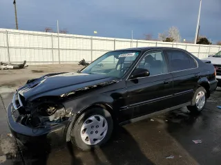 1997 Honda Civic EX with VIN 1HGEJ8646VL033197, listed as a Copart auction lot 84891944 with 0 mi miles and Salvage Title. Bid and sale history available at carsss.com. Image 1.