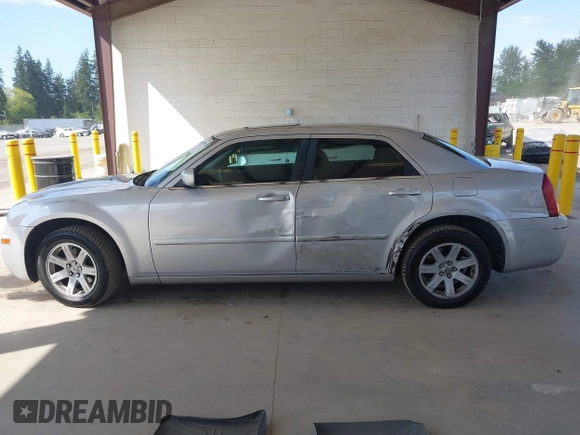 2005 Chrysler 300 Touring with VIN 2C3JA53G75H687752, listed as a IAAI auction lot 42190758 with 170,269 mi miles and . Bid and sale history available at DreamBid. Image 14.