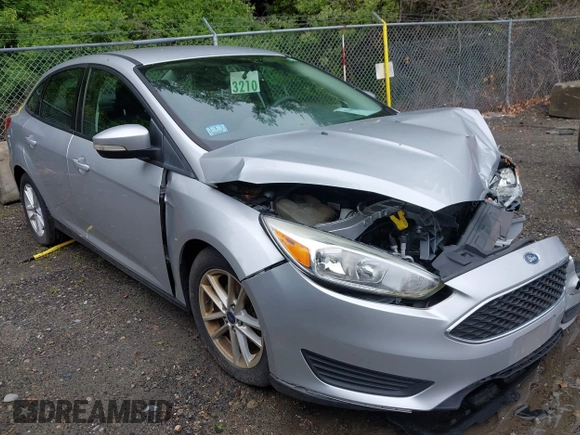 2016 Ford Focus SE z VIN 1FADP3F29GL353908, wystawiony jako IAAI lot #42289308 z przebiegiem 94 937 mil mil oraz . Historia ofert i sprzedaży dostępna na DreamBid. Obrazek 1.
