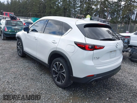 2023 Mazda CX-5 2.5 S Premium Plus Package with VIN JM3KFBEM3P0236481, listed as a IAAI auction lot 41815369 with 34,679 mi miles. Bid and sale history available at carsss.com. Image 3.