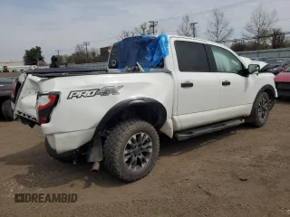 2021 Nissan Titan Pro-4X с VIN 1N6AA1ED9MN522375, выставлен на аукционе Copart как лот 54045655 с пробегом Не указан миль и Списание • Salvage title. История ставок и продаж доступна на DreamBid. Изображение 3.