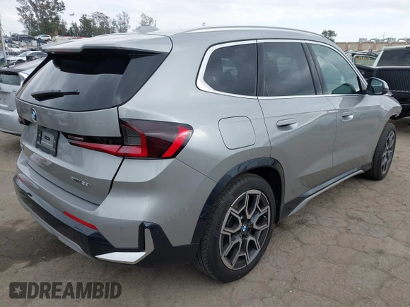 2023 BMW X1 xDrive28i with VIN WBX73EF02P5Y08733, listed as a IAAI auction lot 41901171 with 13,684 mi miles and . Bid and sale history available at DreamBid. Image 4.