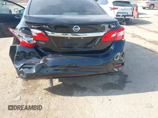 2019 Nissan Sentra S z VIN 3N1AB7AP3KY218433, wystawiony jako IAAI lot #42049945 z przebiegiem 108 874 mil mil oraz . Historia ofert i sprzedaży dostępna na DreamBid. Obrazek 6.