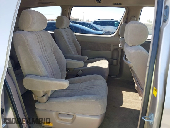 2002 Toyota Sienna LE with VIN 4T3ZF13CX2U500604, listed as a IAAI auction lot 41834778 with 139,668 mi miles. Bid and sale history available at carsss.com. Image 8.