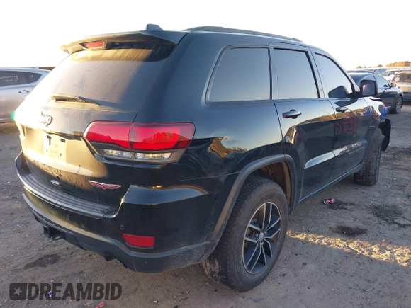 2018 Jeep Grand Cherokee Trailhawk with VIN 1C4RJFLT2JC349450, listed as a IAAI auction lot 40848526 with 139,326 mi miles and . Bid and sale history available at DreamBid. Image 4.